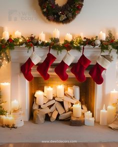 christmas stockings hung over a fireplace with candles