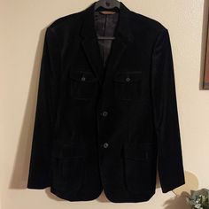 Perry Ellis Velvet Black Men Jacket. Length 30” . Bust Across 20”. ** No Size Tag**. New Without Tags Formal Black Outerwear With Patch Pockets, Black Tailored Outerwear With Patch Pockets, Tailored Black Outerwear With Patch Pockets, Black Sport Coat With Notch Lapel And Pockets, Black Notch Lapel Sport Coat With Pockets, Tailored Black Sport Coat With Pockets, Fitted Black Blazer With Patch Pockets, Vintage Business Casual Outerwear With Pockets, Fitted Black Sport Coat With Pockets