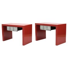 two red end tables sitting next to each other