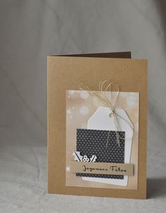 a card with a tag attached to it