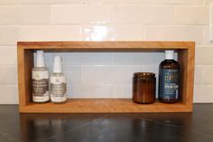 This handcrafted hardwood box shelf is a versatile and stylish storage solution for your kitchen, bathroom, or any other room in your home. Made from solid hardwood, this shelf is available in three natural finishes - real walnut, maple, and cherry wood - so you can choose the one that best fits your decor. The cherry wood finish pictured gives the shelf a warm and inviting look that will complement any style of home. This shelf can be mounted on the wall or set on the countertop, providing ample storage space for coffee and tea cups, supplements, spices, bathroom essentials, and much more. The keyhole slots on the back and the included hardware make mounting the shelf a breeze. The shelf has a size of 20 inches wide by 8 inches tall by 4 inches deep, with an usable space of 18 1/2 inches Floating Rectangle Box Shelf, Rectangle Shelf, Box Shelf, Box Shelves, Stylish Storage Solutions, Picture On Wood, Bathroom Essentials, Stylish Storage, Cherry Wood