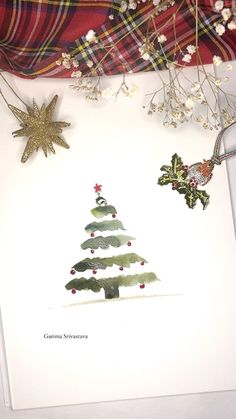 a card with a christmas tree on it