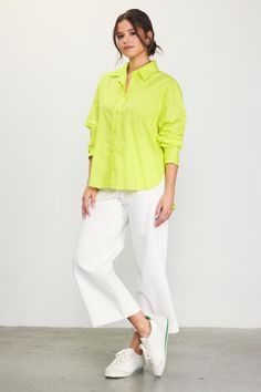 Crisp poplin lends an airy feel to this button-up shirt. Designed for a relaxed fit with a slightly open neckline, the long-sleeve style is a breeze to style with jeans, tailored pants, and skirts of all kinds. •Pointed collar •Relaxed neckline •Button front placket •Long sleeves •Button cuffs Item Number: 45737 100% POLYESTER Vacation Dresses Casual, Wedding Guest Dress Trends, Lime Yellow, Casual Wedding Dress, Tailored Pants, Sweater Sale, Trending Dresses, Skirts For Sale, Item Number