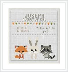 a cross stitch pattern with two animals and the words joseph, august's birth