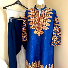 Pakistani Rivaaj! Navy Blue Outfit Chest 40 Waist 40 Hips 48 Sleeves 17 Back Shoulder 15 Length Of Shirt 35 Trousers 37 Royal Blue Fitted Kurta, Fitted Blue Kurta With Floral Embroidery, Blue Sets With Dabka Work For Spring, Traditional Blue Kurta With Gold Embroidery, Unstitched Embroidered Blue Dresses, Royal Blue Kurta For Festive Occasions, Royal Blue Kurta For Eid, Long Sleeve Blue Sets With Intricate Embroidery, Blue Long Sleeve Sets With Intricate Embroidery