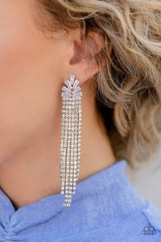 Sparkly strands of dainty white rhinestones stream out from the bottom of a silver frame made up of a staggered collection of iridescent and trapezoidal cut rhinestones, resulting in a timeless tassel. Earring attaches to a standard post fitting. Sold as one pair of post earrings. Diamante Earrings, Radiant Beauty, Silver Chandelier Earrings, Stud Design, Stylish Earrings, Rainbow Earrings, Next Clothes, Paparazzi Accessories, Fall Accessories