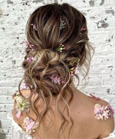 Wavy Bun with Flowers Fairy Princess Wedding Hair, Floral Updo Hairstyles, Enchanted Garden Hairstyle, Fairytale Updo, Messy Bun With Flowers, Boho Wedding Hair Updo, Fairy Wedding Hair, Bohemian Updo Hairstyles, Boho Wedding Hair Flowers