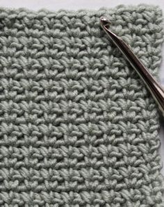 the crochet stitch is being worked on