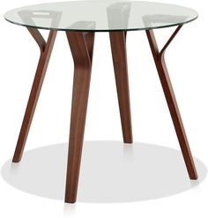 a round glass table with wooden legs