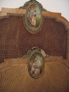 two paintings on the back of a bed with wicker headboard and foot board