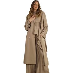 Elevate your outerwear game with our Pleated Trench Coat. Perfect for sophisticated style in any weather, this coat features elegant pleating that adds a touch of flair to the classic trench design. Pair it with your favorite outfits for a look that's both timeless and chic, keeping you warm and fashionable all season long. Shop more coats!! Model is wearing a small Available in Cream Ash Taupe Long sleeves Pleats in back Buttons Tie at waist 100% polyester Still not sure which size to get? Ask Long Gabardine Pea Coat For Spring, Spring Gabardine Long Pea Coat, Spring Long Gabardine Pea Coat, Chic Long Coat With Hidden Button Closure, Fall Gabardine Outerwear With Hidden Button Closure, Elegant Outerwear With Belted Cuffs, Spring Formal Gabardine Pea Coat, Elegant Long Sleeve Outerwear With Belted Cuffs, Chic Gabardine Outerwear For Office