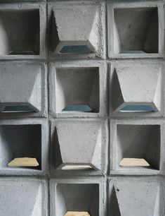 concrete blocks are stacked together to form a wall