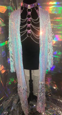 This EXTRA af Confetti Jacket is a Fun mix and match sequin robe / jacket for any magical day! Available in many sequin colors and styles! Input sequin type in custom comment box before playing your order.  Make sure to pick sleeve, body, and / Or trim style. Photos show style with names to select at checkout. Please advise, paillete sequins are at high risk of fallout. Must be worn with care.  All designed as oversized fit.  Estimated 30 in chest width. Custom sizing is available. Please DM.  F White Sequined Outerwear For Party, Sequin Outerwear For Party Season And Festivals, Winter Festival Sequined Outerwear, Bohemian Party Outerwear With Sequins, Halloween Rave, Edm Fashion, Sequin Kimono, Edc Outfits, Party Jackets