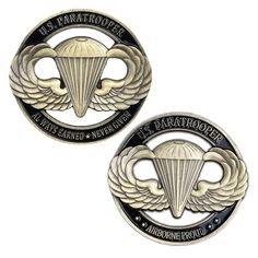 two badges with wings and parachutes on them