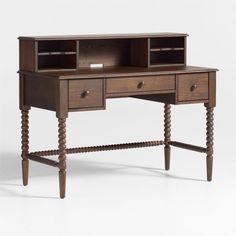 a wooden desk with two drawers on one side and an open bookcase on the other