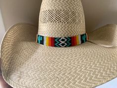 "7/8\" Wide Cactus Hat band All bead work is beaded with 10lb extreme braided nylon line. All hat bands are finished at 23\" with glued than sewed down leather ends and an adjustable leather tie." Adjustable Multicolor Ranch Hats, Braided Hat Bands For Festivals With Flat Brim, Adjustable Multicolor Country Straw Hat, Adjustable Beaded Straw Hat For Country Events, Adjustable Woven Hat With Flat Crown, Adjustable Multicolor Hat Bands For Rodeo, Southwestern Multicolor Hat Band For Country Events, Southwestern Style Hat Bands For Festival With Flat Crown, Adjustable Artisan Hat Bands For Ranch