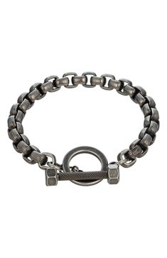 A unique chain bracelet with a toggle closure adds a sleek flair for any outfit. 3" Toggle closure Titanium Imported Metal Chain Bracelet With Toggle Clasp And Rectangular Links, Metal Chain Bracelet With Rectangular Links And Toggle Clasp, Modern Metal Bracelets With Toggle Clasp, Metal Link Chain Bracelet With Toggle Clasp, Classic Metal Chain Bracelet With Toggle Clasp, Adjustable Link Chain Bracelet With Clasp, Metal Link Chain Bracelet With Clasp, Metal Chain Bracelet With Oval Link Clasp, Metal Oval Link Chain Bracelet With Clasp