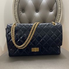 Chanel Reissue 227 Patent Flap Bag Navy Blue Includes Dust Bag, Authenticity Card, Box Size-12*7.5*3 Light Waer Mark, Light Open Mark Inside Formal Blue Bag With Double Flap, Formal Blue Bags With Double Flap, Elegant Blue Double Flap Bag, Formal Blue Double Flap Bag, Luxury Blue Bags For Everyday, Luxury Blue Evening Bag, Blue Luxury Evening Bag With Removable Pouch, Luxury Blue Evening Bag With Removable Pouch, Luxury Bags With Magnetic Closure For Shopping