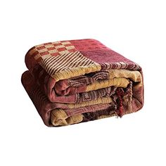 three blankets stacked on top of each other