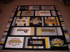 a quilt made to look like the nfl team's logo is displayed on a floor