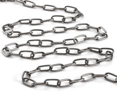 We have hundreds of chains that are sold by the foot. Order however much you need and we'll cut it for you. Our chains range from basic cable chain to intricate, fancy styles. They come in a variety of metals, so you're sure to find what you need. Shop by metal or style below! Gunmetal Cable Chain Link Necklace, Chain Size Chart, Rhinestone Rose, Beads Online, Bead Store, Black Chain, Cut It, Black Rhinestone, Beading Supplies