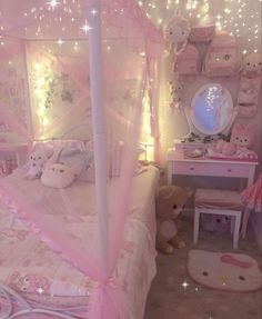 a pink bedroom with teddy bears and lights