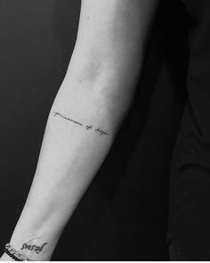 a woman's arm with a tattoo saying, i love you to the moon and back