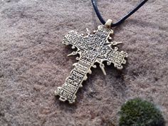 "A copy of the historical findings. The Cossack cross. 16-18 century Description: Double-sided pendant Metal: bronze or silver 925 Weight: approx. 9 g Size: approx. 5,5 x 3,4 cm \\ 2,16\" x 1,33\" Hole size: 2 mm \\ 0,07'' The product will be shipped complete with a cotton cord black color. *The color of real item may be a little different from the pictures due to the display of screen. Bronze - metal, which over time can oxidize and darken on the air. All my creations are intentionally patinate Bronze Brass Cross Necklace, Handmade Bronze Cross Pendant Necklace, Engraved Cross Necklace For Blessing, Handmade Bronze Necklace With Cross Pendant, Medieval Engraved Cross Pendant Jewelry, Medieval Engraved Cross Jewelry, Spiritual Bronze Crucifix Necklace, Bronze Crucifix Necklace For Spiritual Purposes, Bronze Crucifix Necklace As Gift