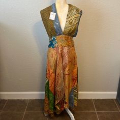 Boho 100% Silk Patchwork Halter Neck Dress. Size S/M True To Size. In Excellent Condition. No Holes Or Stains. Smoke Free Home. Item Details: 100% Silk Measurements: Length 51” Waist 31” (Not Stretched) Waist 36” (Fully Stretched) Metal Mesh Dress, Rose Gold Prom Dress, Velvet Halter Dress, Silk Patchwork, Hand Knitted Dress, Gold Maxi Dress, Gold Prom Dresses, Halter Top Dresses, Dresses Boho