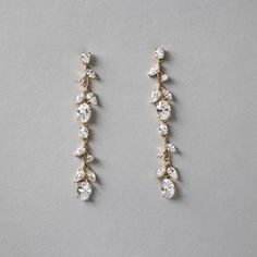 These delicate vine dangle earrings are inspired by nature and created with tiny round and marquise CZ stones with larger oval stones mimicking flower buds. A lovely design for any special occasion. They are about 2.25 inches long and .25 inches wide, rhodium or gold plated, lead, cadmium, and nickel free, grade AAA CZ stones. Wedding Day Jewelry Brides, Gold Bridal Hair Accessories, Evening Eye Makeup, Amazon Wedding, Gold Headpiece, Wedding Day Jewelry, Pinterest Ideas, Vintage Inspired Jewelry, Bride Earrings