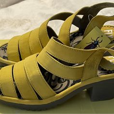 Fly London Woze118fly Bright Yellow Woze Leather Sandal Size 35 Nib Low Heel Leather Footbed Heels For Spring, Spring Low Heel Shoes With Leather Footbed, Spring Block Heel Sandals With Leather Footbed, Spring Block Heel With Leather Footbed, Spring Leather Block Heel Shoes, Spring Block Heel Heels With Leather Footbed, Yellow Casual Sandals With Low Heel, Yellow Low Heel Casual Heels, Casual Yellow Sandals With Low Heel