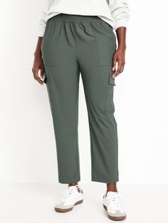 elastic waist front pockets flap-cargo pockets pull-on style go-dry wicks moisture four-way stretch breathable sits at belly button loose hip and thigh tapered leg 27" regular inseam 25" petite inseam 30" tall inseam models are approx.  5'9" and wear sizes s (4), l (12), and xl (18)machine wash according to the care instruction label Athleisure Ankle-length Cargo Pants With Side Pockets, Athleisure Straight Leg Cargo Pants For Workwear, Sporty Tapered Leg Cargo Pants For Work, 4-way Stretch Activewear With Pockets Ankle-length, 4-way Stretch Athleisure Cargo Pants, Fall Activewear With Pockets And Comfort Stretch, Sporty Ankle-length Cargo Pants For Work, Comfort Stretch Activewear With Pockets For Fall, Sporty Cargo Pants With Side Pockets For Work