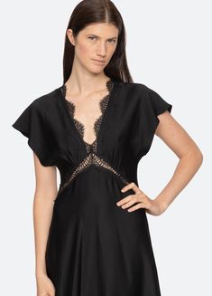 The Noa satin v-neck dress features short dolman sleeves, delicate lace trim detailing, and a midi silhouette. Details: 100% polyester invisible back zipper designed for a slimmer fit style #RS25-061 model is 5'10'' and wearing a size 4 Mid Dresses, Kids Sleepwear, Fit Style, V Neck Dress, Denim Shop, Dolman Sleeve, Mommy And Me, Pre Order, Lace Trim