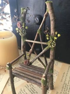 a miniature chair made out of sticks and branches