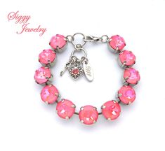 Swarovski bracelet, Bright pink bracelet, Bubble gum pink, Ultra pink coral, Chunky crystal bracelet If you're looking for arm candy this is it! Shimmering ultra pink coral Swarovski crystals make up this fun and flirty tennis bracelet. These are 11mm Swarovski crystal chatons that have been given a special coating called Ultra Pink Coral that gives them an iridescent glow. This is a gorgeous bubble gum pink/coral color that really pops and will look great on its own or stacked with smaller ston Nickel-free Pink Crystal Bracelet As A Gift, Adjustable Nickel-free Pink Crystal Bracelet, Bubble Gum Pink, Swarovski Crystal Jewelry, Swarovski Crystal Bracelet, Swarovski Bracelet, Pink Coral, Pink Bracelet, Matching Bracelets