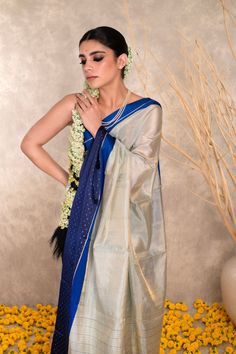 Expertly handwoven with lightweight cotton tissue, this Banarasi saree boasts a stunning designer Mashru border. Its smooth texture makes it effortless to drape, perfect for any occasion. Elevate your style game with this exquisite blend of traditional and modern craftsmanship. Festive Saree With Sheer Dupatta In Slub Silk, Slub Silk Saree With Sheer Dupatta, Elegant Cotton Silk Pre-draped Saree With Border, Designer Cotton Silk Pre-draped Saree With Border, Festive Slub Silk Saree With Sheer Dupatta, Festive Banarasi Silk Pre-draped Saree With Border, Traditional Drape Saree With Sheer Dupatta In Slub Silk, Wedding Raw Silk Pre-draped Saree With Border, Designer Handloom Chanderi Pre-draped Saree