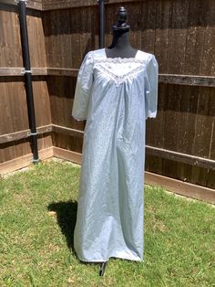 Stunning 1950s night gown in perfect condition. Light blue satin damask. Beautiful adornment around neck. Size medium. Blue Vintage Wedding Nightgown, Vintage Blue Wedding Nightgown, Vintage Satin Wedding Sleepwear, Vintage Satin Sleepwear For Wedding, Vintage Satin Nightgown For Sleep, Vintage Satin Sleepwear, Vintage Cotton Nightgown For Weddings, Blue Vintage Cotton Nightgown, Vintage Blue Cotton Nightgown