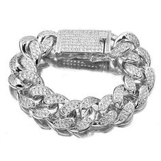 Il s'agit d'une version audacieuse d'un véritable classique : le bracelet chaîne cubaine. Cette version dégoulinante de glace fera assurément sensation. Portez-le seul ou associez-le à des pièces plus sobres pour le faire ressortir encore plus. Disponible en deux tailles différentes pour que vous puissiez le porter aussi serré ou aussi ample que vous le souhaitez.

Longueur de la chaîne : 8 pouces/9 pouces Silver Cuban Chain, Cuban Link Chain Men, Cuban Chain Bracelet, Hip Hop Bling, Cuban Link Bracelet, Miami Cuban Link Chain, Miami Cuban Link, Miami Cuban, Silver Chain Bracelet