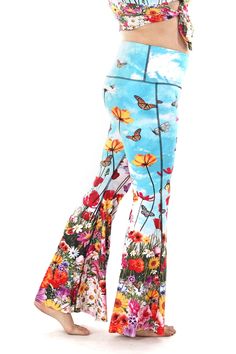 Yoga Democracy Eco-friendly bell bottoms in flower bomb print Summer Stretch Blue Flares, Blue Stretch Flares For Summer, Summer Stretch Flare Pants, Spring Flare Stretch Activewear, Spring Stretch Flare Activewear, Flared Spring Activewear, Stretch Flare Activewear For Spring, Fitted Wide Leg Yoga Flares, Fitted Yoga Pants For Summer Pilates