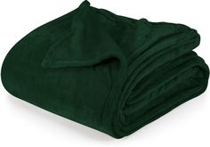 a green blanket folded on top of each other