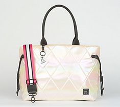 a white purse with pink and black straps on the handle, sitting against a white background