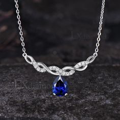 Item description ✦ Handmade, high-quality item! ✦ Material: 925 sterling silver, Solid 14K/18K GOLD (can be made in white/rose/yellow gold), Platinum ✦ Center Stone: 6x8mm Pear Cut Lab Blue Sapphire ✦ Side Stones: Round Cut Moissanites ✦ Chain length can be adjusted between 16 inches and 18 inches As it is handmade, it needs 2-4 weeks to finish and then be shipped by USPS or FedEx. Return policy: We offer 30 days return policy. For any reason, if you are not completely satisfied with your order, you may return it for a refund.  Buyer is responsible for the handcraft fee (15%-30% of the total price) and the return shipping cost. White Gold Sapphire Pear-shaped Necklace, Pear-shaped Sapphire Necklace In White Gold, Silver Drop Sapphire Necklace, Diamond Cut Lab-created Sapphire Necklace As Gift, White Gold Sapphire Teardrop Pendant Necklace, Sapphire Necklace With Prong Setting For Anniversary, Sapphire Necklaces For Anniversary, Gift Sapphire Diamond Cut Necklace, Gift Necklace With Lab-created Sapphire And Diamond Cut