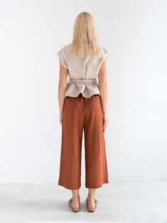 "ALEXANDRA is a linen tie waist top. DETAILS - Cap sleeve design - Crew neck - Self tie belt - 100% lightweight European linen fabric - Cut and sewn to order just for you in our studio COLOR - Beige, you can also choose other colors above - Fabric samples are available here https://www.etsy.com/listing/586569696/linen-fabric-samples SIZING & FIT - Relaxed, loose fit - Length (shoulder to hem) is approximately 22.5 inches / 57 cm - Bust (pit to pit) is approximately 20.5 inches / 52 cm - Shou Versatile Linen Blouse For Work, Versatile Linen Tops For Work, Chic Linen Tops For Workwear, Tie Waist Short Sleeve Tops For Work, Short Sleeve Tie Waist Tops For Work, Short Sleeve Tops With Tie Waist For Work, Beige Linen Blouse For Workwear, Cropped Linen Top For Fall, Summer Workwear Belted Blouse