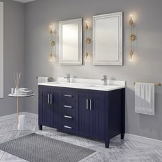 a bathroom with two sinks and mirrors on the wall