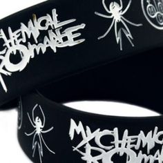 two black bracelets with white writing on them and spiderman logos in the middle