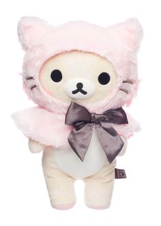 a small stuffed animal with a bow on it's head and eyes, wearing a pink fur coat