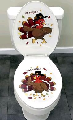 a white toilet with a turkey on it's lid and the words, no thanks give thanks