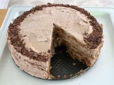 a chocolate cake with one slice missing from it