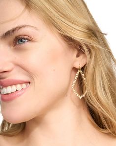 An icon dressed in sparkle, the Sophee Crystal Drop Earrings in Gold bring you serious glamour in a lightweight, ultra wearable frame. Metal 14k Yellow Gold Over Brass Size 2.25" L X 1.25" W on ear wire Please note: Due to the one-of-a-kind nature of the medium, exact colors and patterns may vary slightly from the image shown. | Kendra Scott Sophee Crystal Drop Earrings in Gold | Metal Kendra Scott Store, Rebecca Robeson, Candle Ribbon, Stocking Stuffers For Her, Iconic Dresses, Holiday Sparkle, Open Frame, Linen Spray, Earrings In Gold