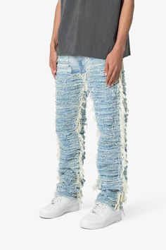 the V631 Allover Frayed Denims are designed with a baggy fit throughout, featuring a vintage wash, exposed and raw seams throughout, and finished off with raw hem. details relaxed fit* 100% cotton zipper at inseam model is 6’1, 140 lbs and wears a size 30 Urban Distressed Denim Blue Flare Jeans, Urban Style Distressed Denim Blue Flare Jeans, Urban Denim Blue Distressed Flare Jeans, Distressed Blue Flare Jeans For Streetwear, Blue Ripped Cotton Cargo Jeans, Acid Wash Denim Cutoff Jeans, Washed Blue Jeans With Frayed Hem For Streetwear, Dark Wash Denim Pants With Frayed Hem, Ripped Blue Straight Leg Cargo Jeans